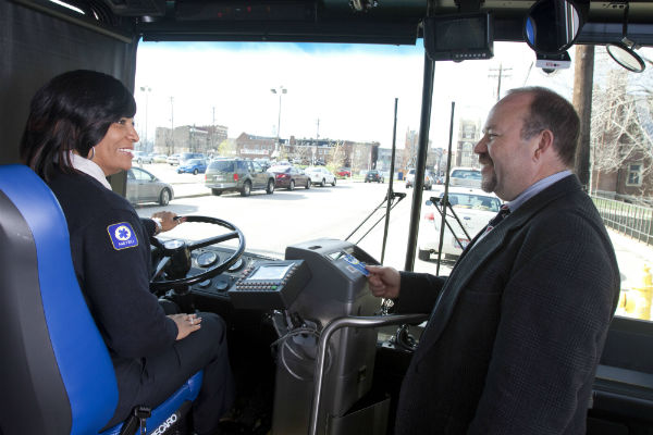 man boarding bus