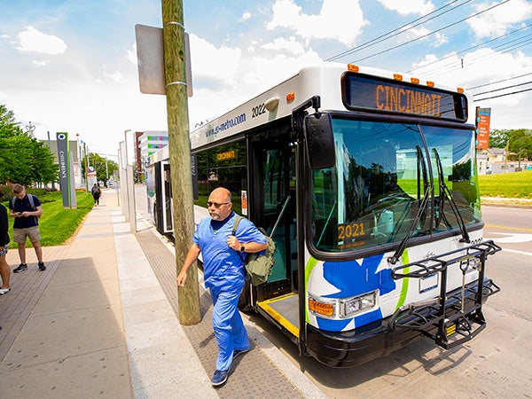 medical staff gets off bus