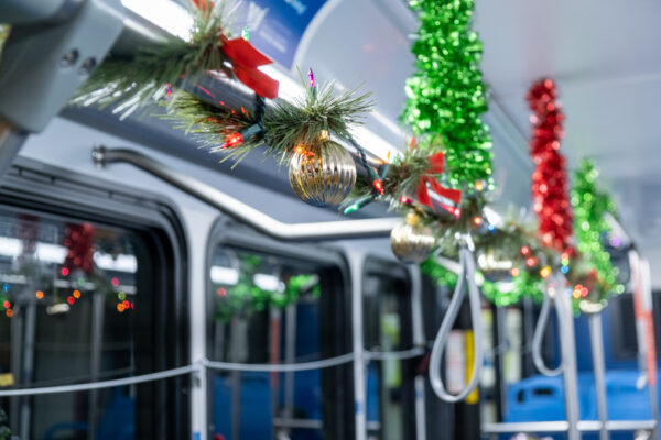 Inside of a bus covered in festive decorations